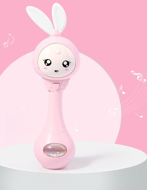 Baby Musical Rattle with Flashing Lights & Teether | 6 Music Modes Bunny Sensory Toy | Newborn Sound & Light Rattle | Baby Shower Gift Ages 0β12M | BUBINNA BunnyBeat-pink